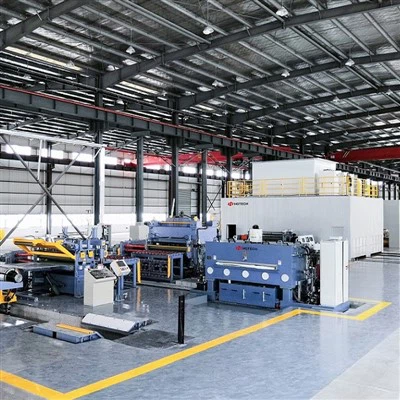 Котушка, що годується лазерною машиною